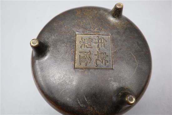 A Chinese bronze shallow tripod censer, Qianlong mark, late Qing, diameter 15cm, together with a Canton ivory card case